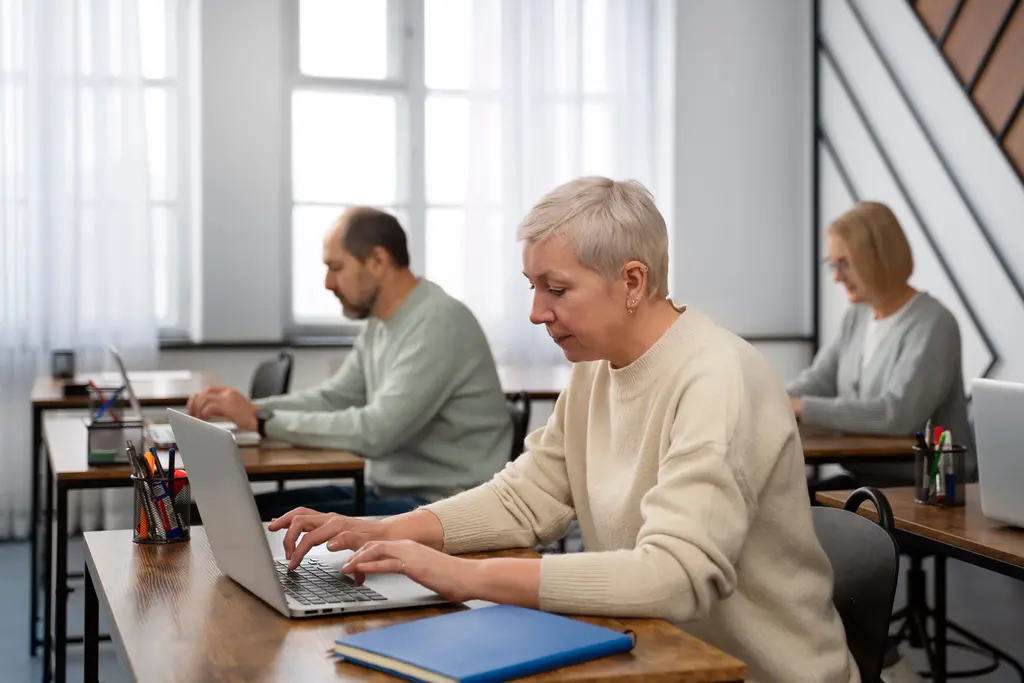 Executivos estudando sobre cultura de aprendizagem e Lifelong Learning em escolas de negócios.