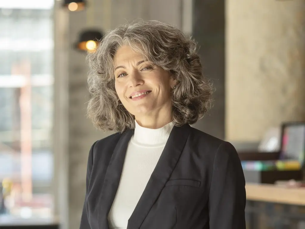 Executiva confiante após ver o funcionamento do BPM implementado em sua empresa.